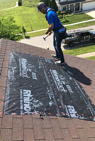 Moisture detection in roofing materials