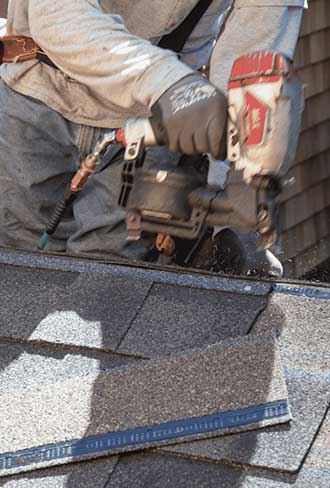 Professional roofing tools used during a thorough roof inspection for safety and damage assessment